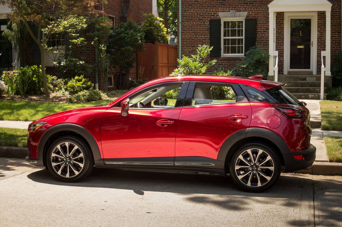 Side view of a red 2019 Mazda CX-3