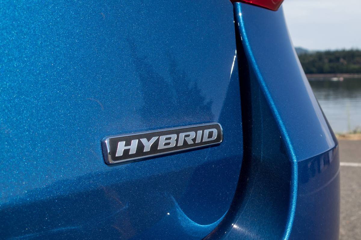 03 ford explorer hybrid limited 2020 badge  blue  exterior  rear jpg