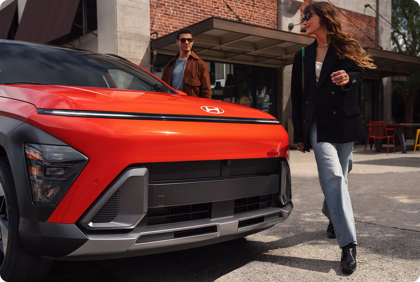 2025-Hyundai-Kona-on-street-with-people-OEM