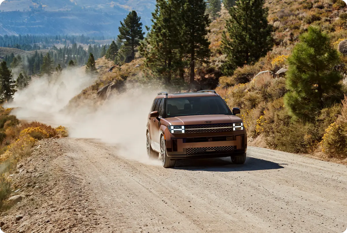 2026 Hyundai SANTA FE on dirt road OEM image png