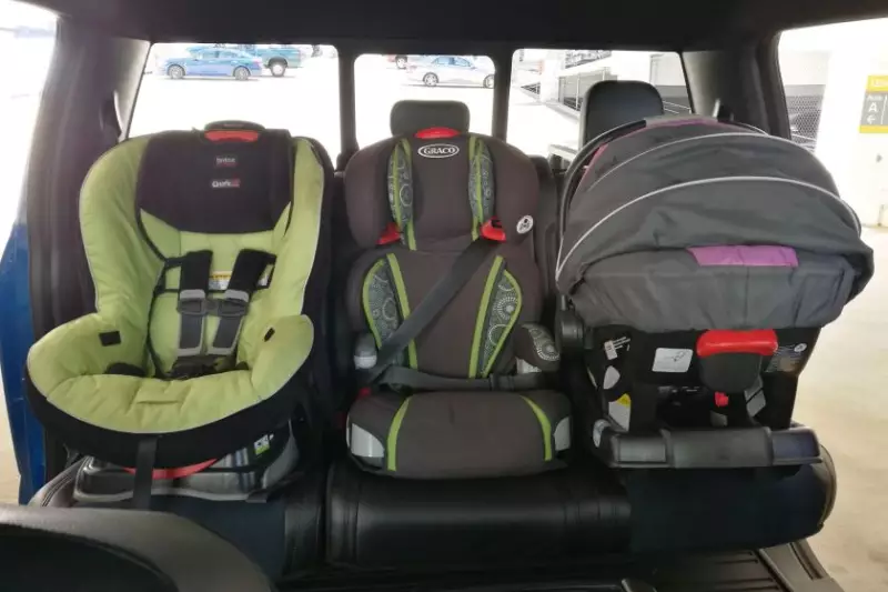 Three car seats in a 2019 Ford F-150 Raptor
