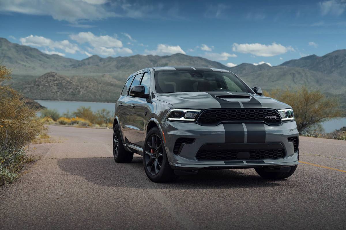 A 2021 Dodge Durango SRT Hellcat driving in front of mountains