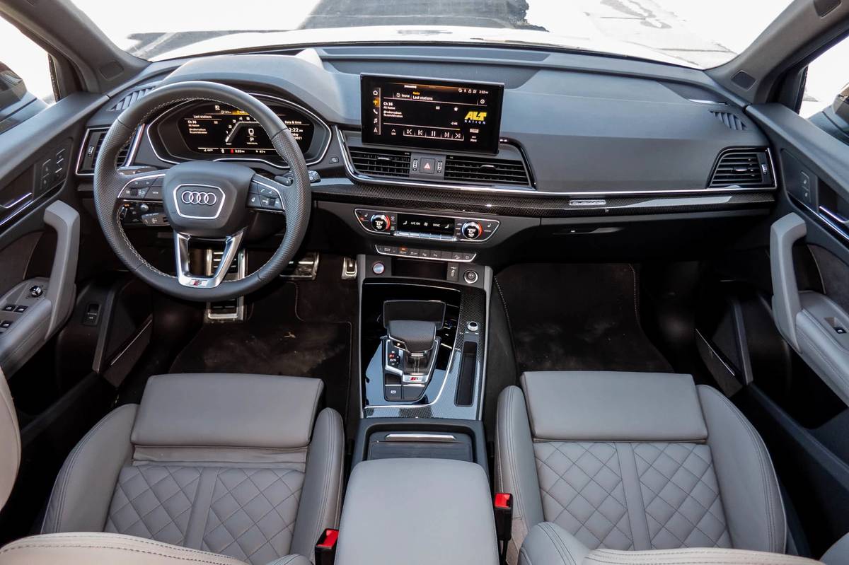 https://images.cars.com/cldstatic/wp-content/uploads/audi-sq5-2021-13-cockpit-shot--dashboard--front-row--interior.jpg