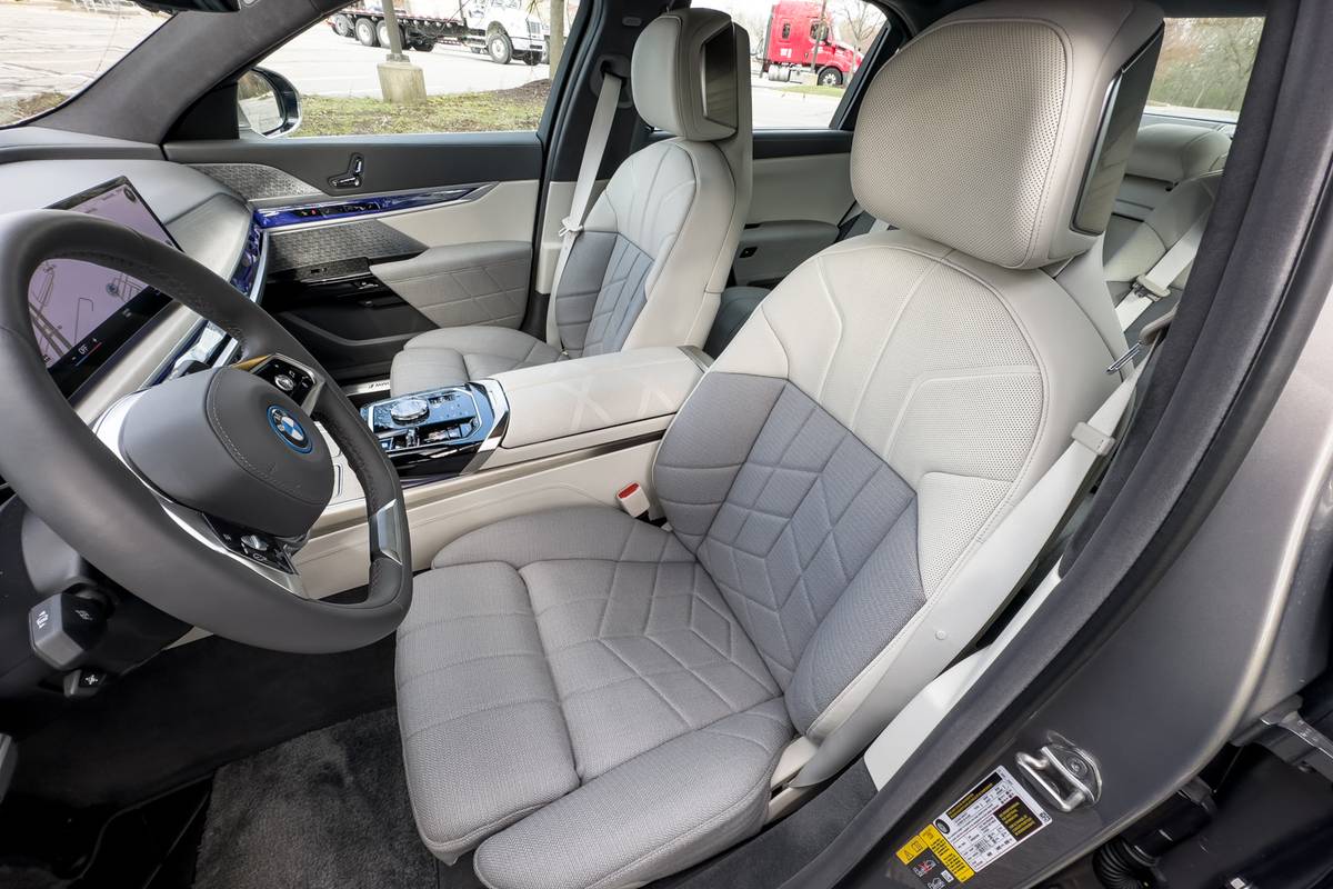 https://images.cars.com/cldstatic/wp-content/uploads/bmw-i7-2023-18-interior-front-row-seat.jpg