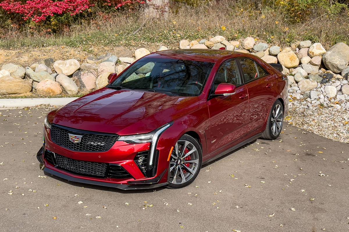 cadillac-ct4-v-blackwing-2022-01-exterior-front-angle-overhead-angle-red-sedan