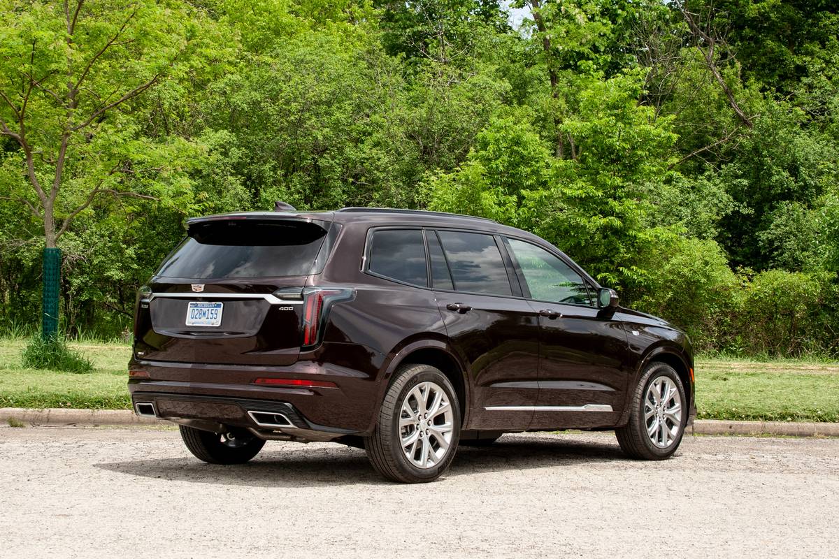 https://images.cars.com/cldstatic/wp-content/uploads/cadillac-xt6-2020-02-exterior--maroon--rear-angle.jpg