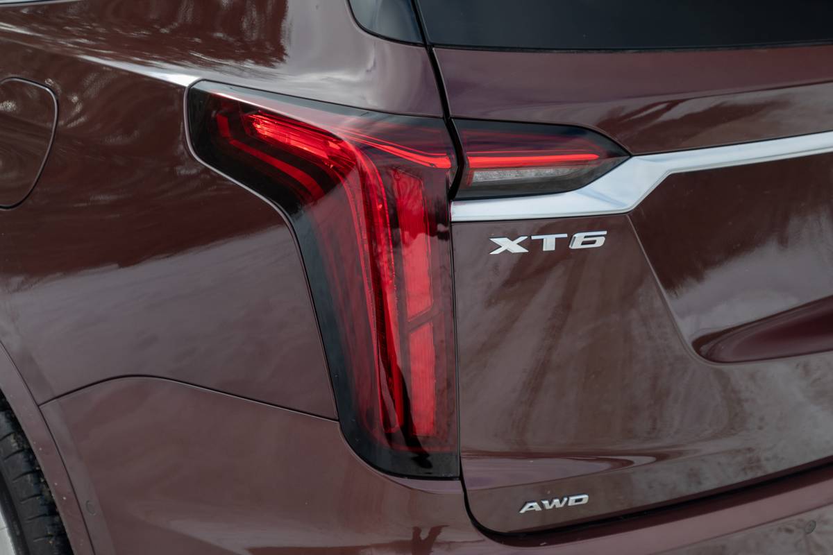 cadillac xt6 2022 09 badge brown exterior suv taillights scaled jpg