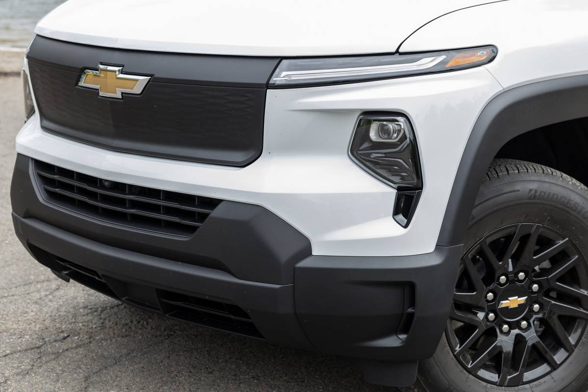 chevrolet silverado ev wt 2024 04 exterior headlight scaled jpg