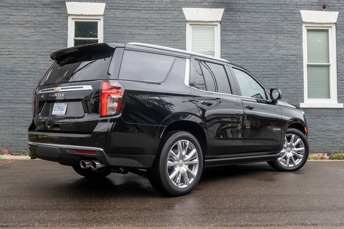 Rear angle view of a black 2021 Chevrolet Tahoe High Country