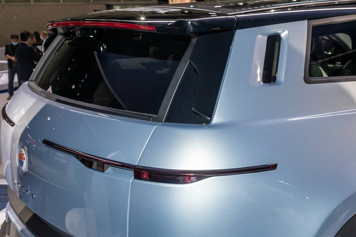 fisker ocean 2023 09 blue exterior rear angle suv taillights jpg