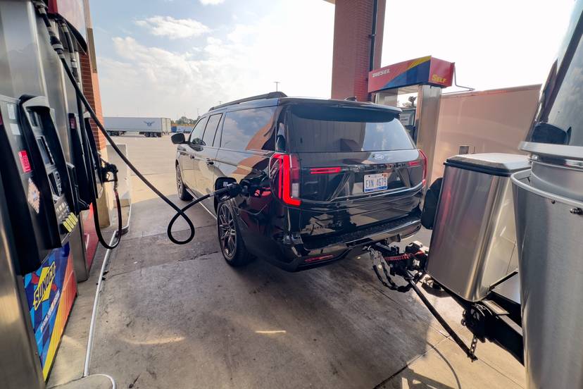 ford-expedition-max-platinum-2025-04-exterior-gas-station-rear-angle