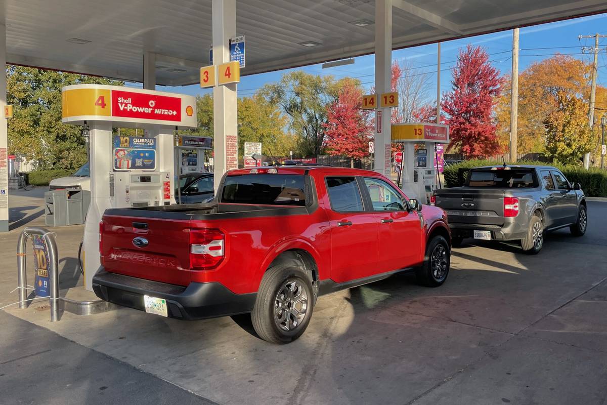 (From left) 2022 Ford Maverick XLT EcoBoost and Lariat hybrid | Cars.com photo by Christian Lantry