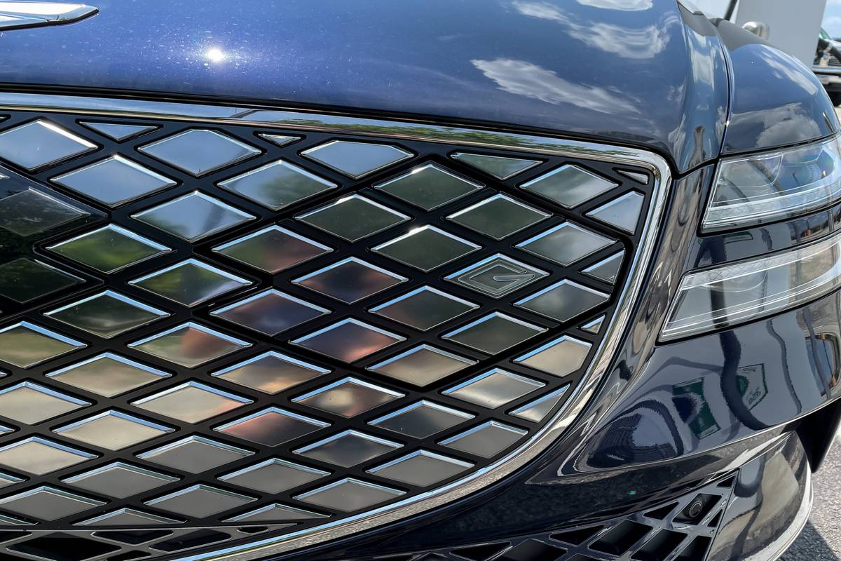 genesis electrified g80 2023 02 exterior grille badge scaled jpg