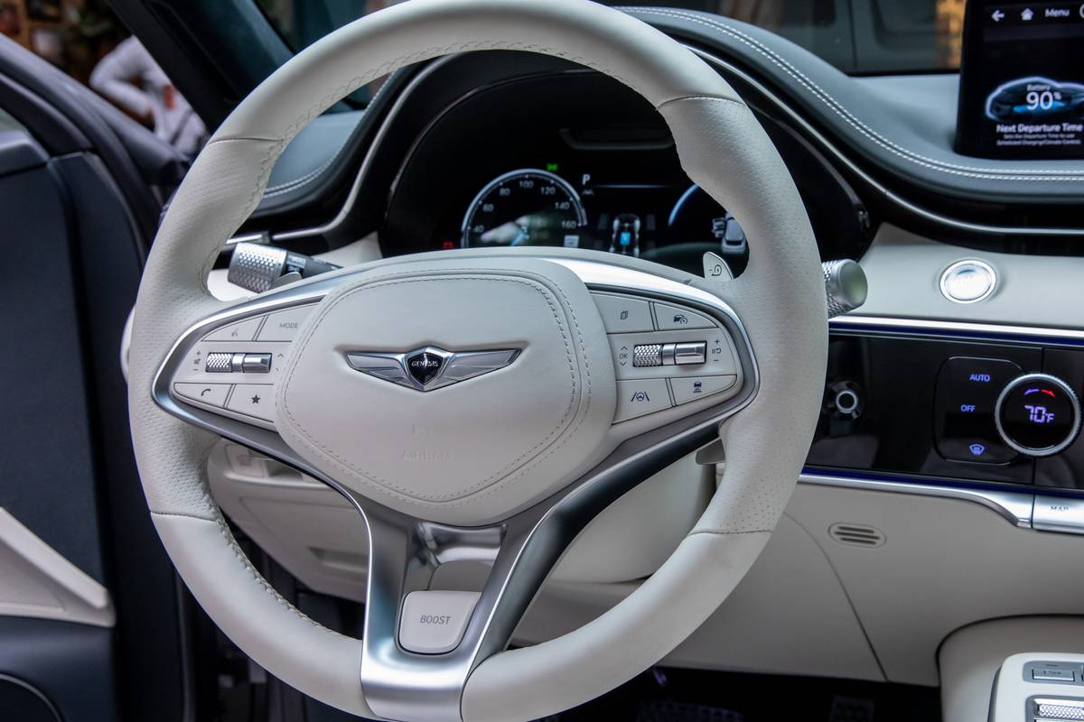 genesis electrified gv70 2023 22 interior steering wheel scaled jpg