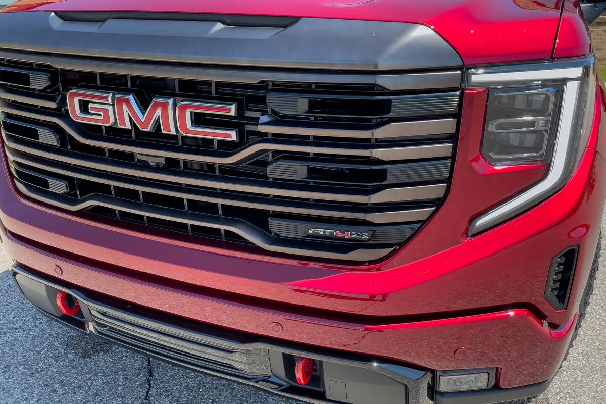 gmc sierra 1500 at4x 2022 03 exterior red grille badge scaled jpg