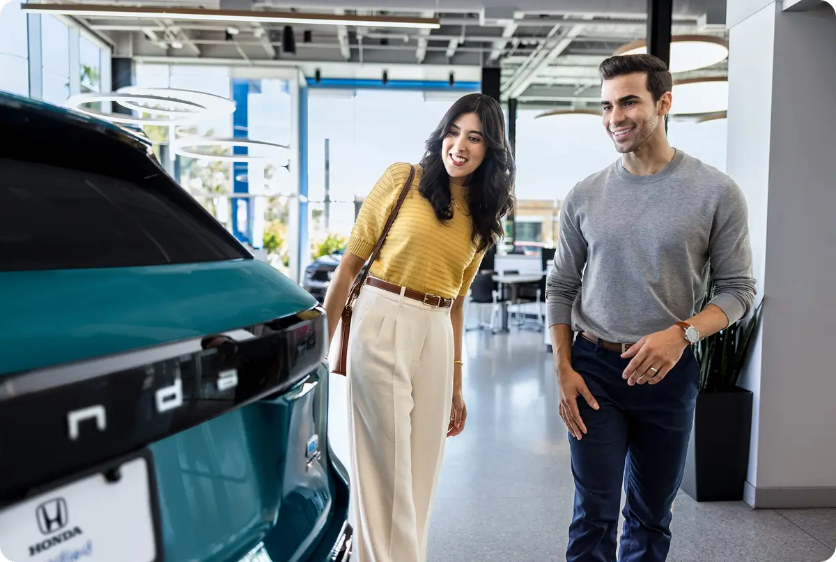 honda cpo couple looking at honda png