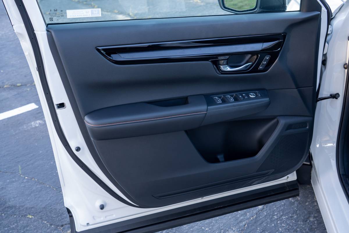 honda cr v hybrid sport touring 2026 11 interior driver door scaled jpg
