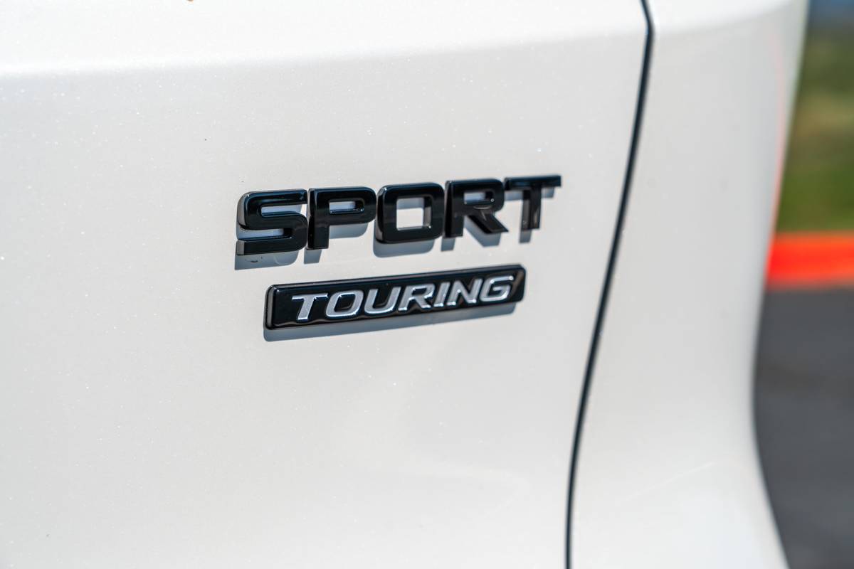 honda cr v hybrid sport touring 2026 49 exterior badge detail scaled jpg