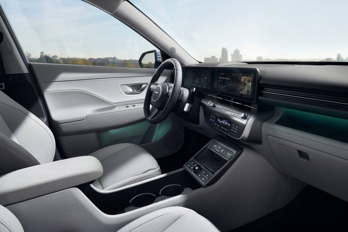 https://images.cars.com/cldstatic/wp-content/uploads/hyundai-kona-electric-2024-interior-oem-05.jpg