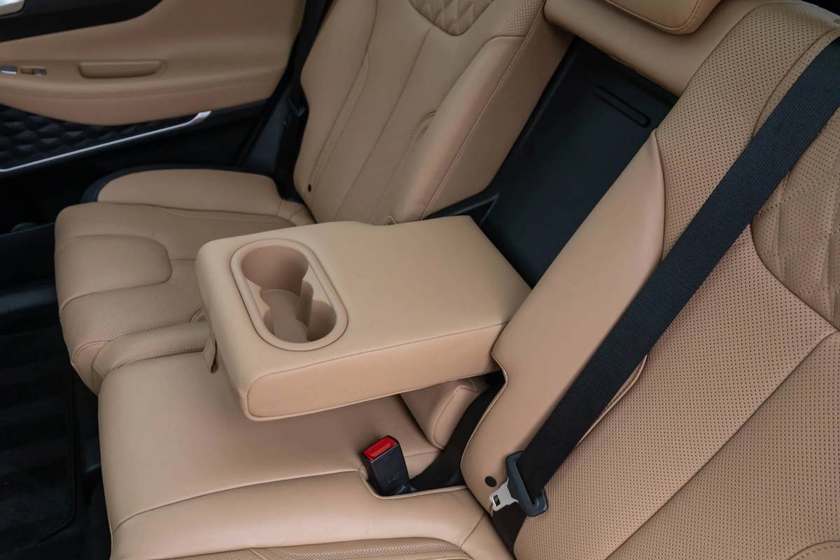 hyundai santa fe 2021  53 armrest  backseat  cupholders  interior jpg