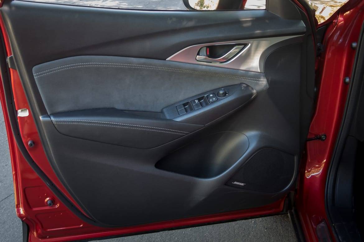 Attention to detail shows in the Grand Touring model’s door panels. | Cars.com photo by Fred Meier