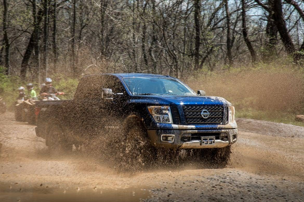 30-nissan-titan-2018-angle--blue--dynamic--exterior--front--off-