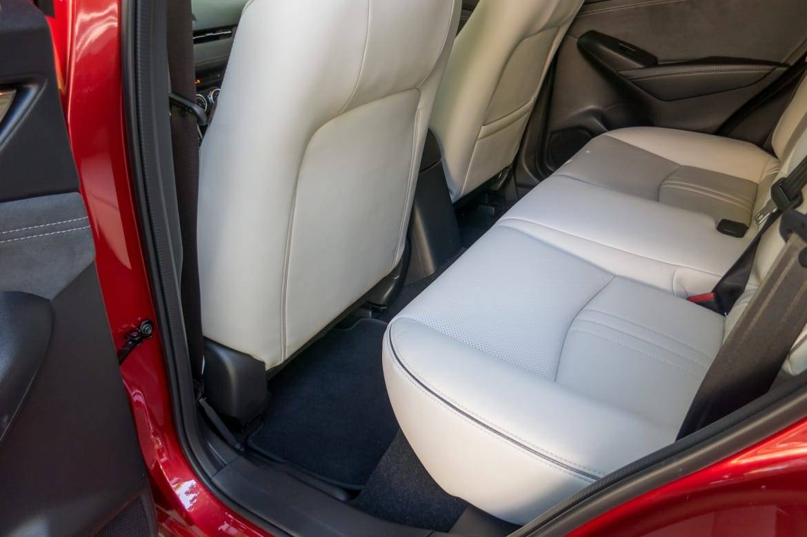 Legroom is in short supply in the CX-3’s backseat. | Cars.com photo by Fred Meier