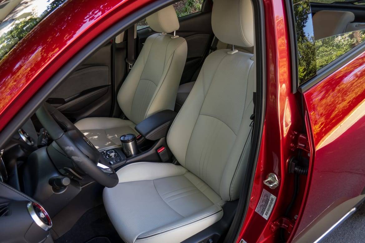 Newly shaped and padded front seats are more comfortable, and seats now are full leather in the Grand Touring. | Cars.com photo by Fred Meier