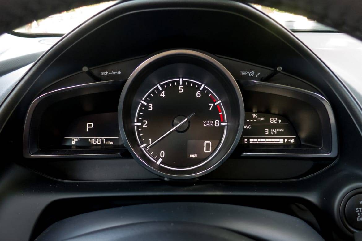The Grand Touring gauge cluster is dominated by a large tachometer with digital speedometer. | Cars.com photo by Fred Meier