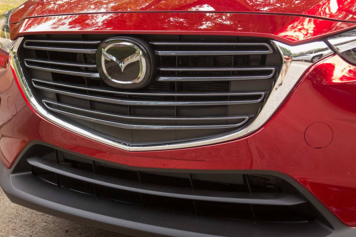 The 2019 CX-3 has a bolder four-bar grille. | Cars.com photo by Fred Meier