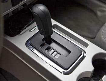 The automatic transmission (above) is now a six-speed, replacing the long-standing four-speed. The effects are seen in better acceleration and improved mileage &#x2014; especially with the 2.5-liter four-cylinder (below), also an upgrade for 2009. | 