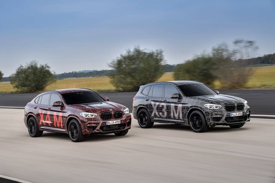 02-bmw-x3-m-and-x4-m-prototype-angle--black--front--head-to-head
