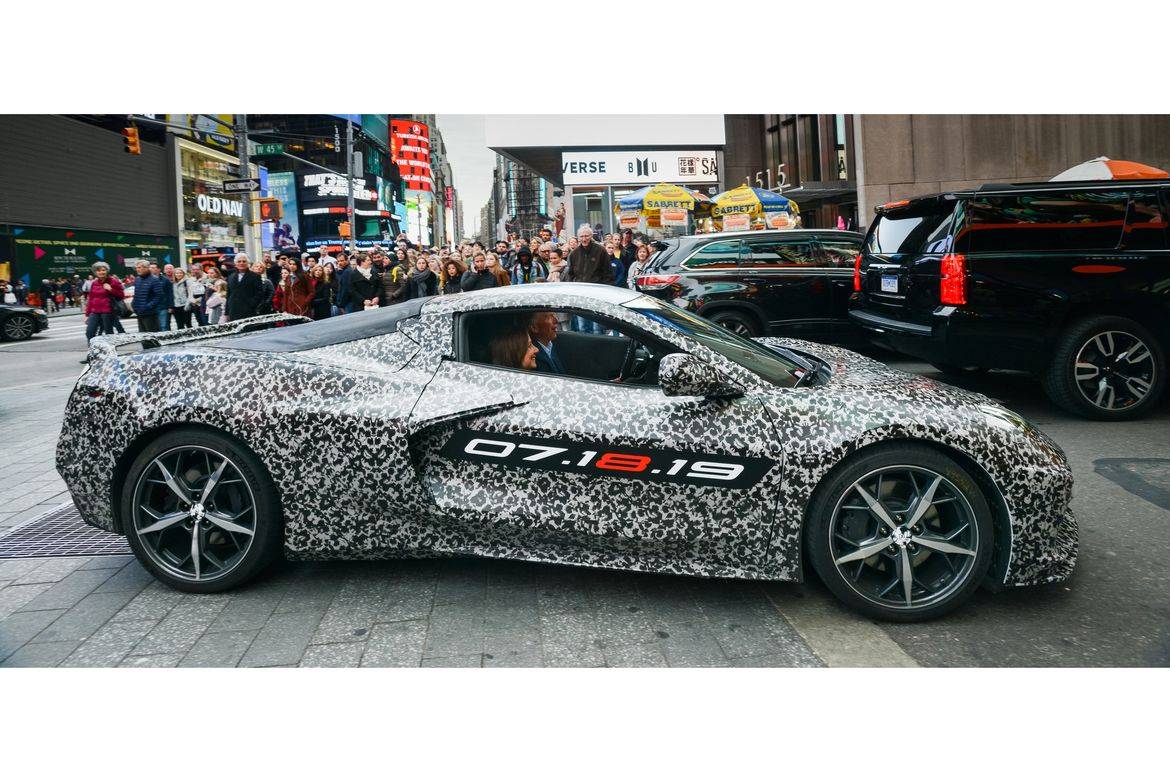 Chevrolet Corvette Chief Engineer Tadge Juechter and General Motors Chairman and CEO Mary Barra drive in a camouflaged next generation Corvette down 7th Avenue near Times Square Thursday, April 11, 2019 in New York, New York. The next generation Corvette will be unveiled on July 18. (Photo by Jennifer Altman for Chevrolet) | 