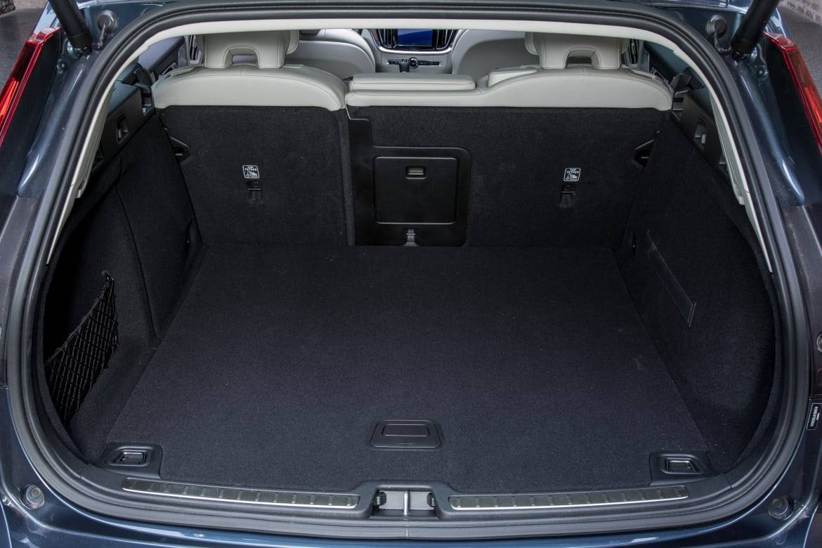 The V60’s modest height limits maximum cargo space, but the floor dimensions behind the backseat beat those of many compact SUVs. | Cars.com photos by Christian Lantry