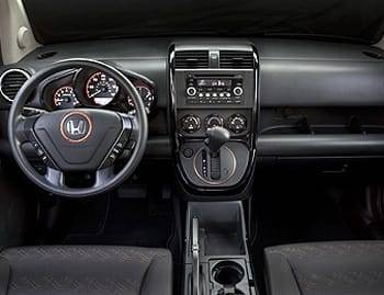 The dashboard has solid fit and finish but lots of cheap, hard plastic. The air conditioning knobs (below) fall easily to hand, but they rely on tiny orange tick marks to indicate fan speed, temperature and airflow. Even when backlit at night, the marking | Manufacturer image