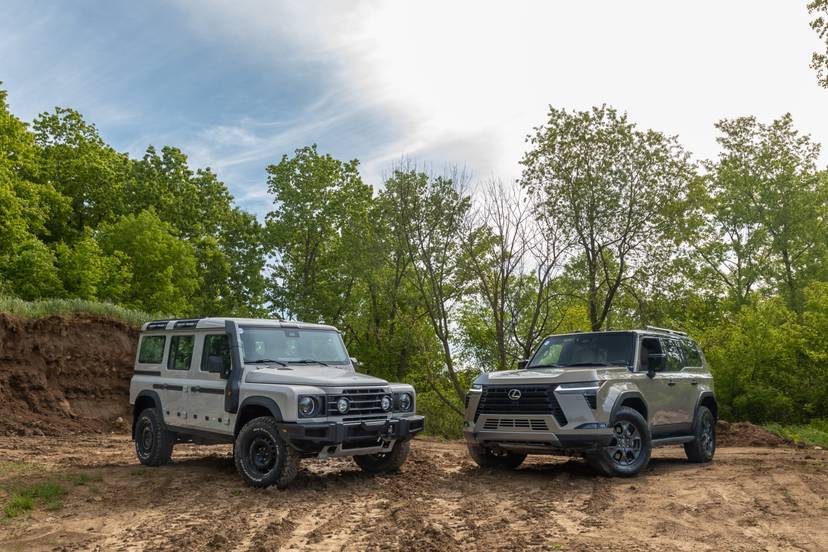 ineos-grenadier-lwb-station-wagon-trialmaster-2024-lexus-gx550-overtrail-2024-01-exterior-group-front-angle