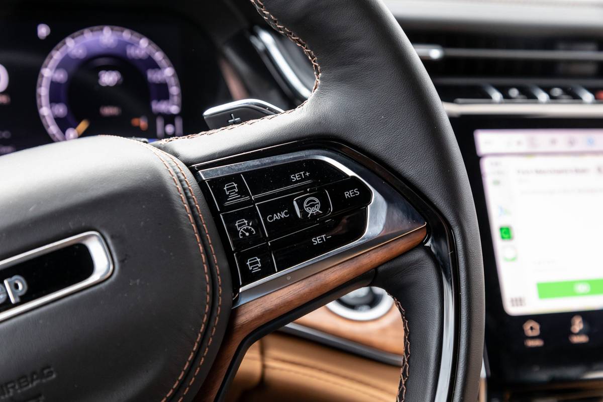 jeep summit reserve 4x4 2022 23 interior controls steering wheel suv scaled jpg