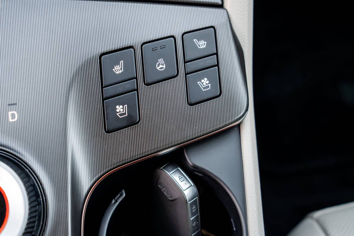 kia sportage hybrid sx prestige awd 2026 27 interior button details scaled jpg