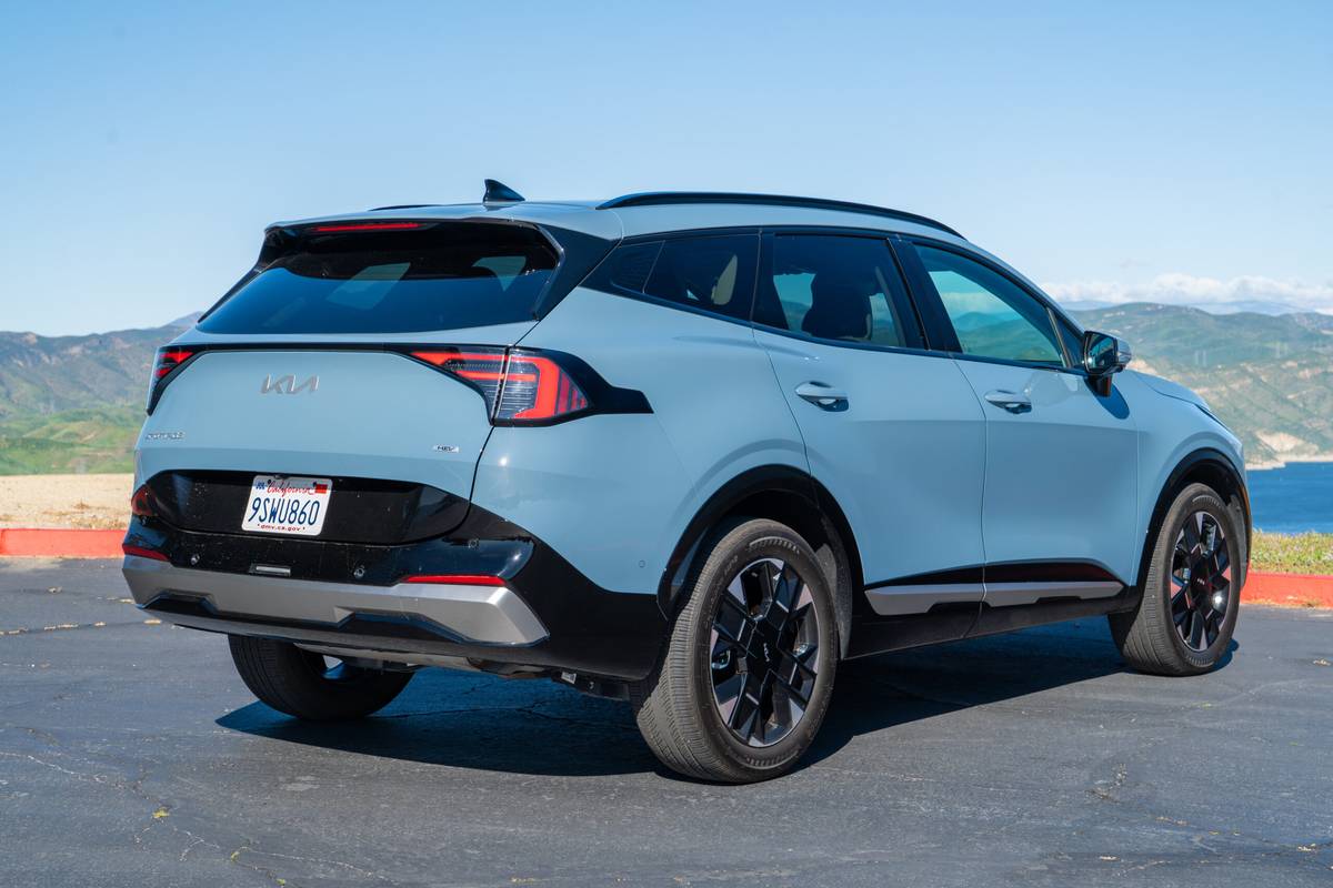 kia sportage hybrid sx prestige awd 2026 50 exterior rear angle scaled jpg