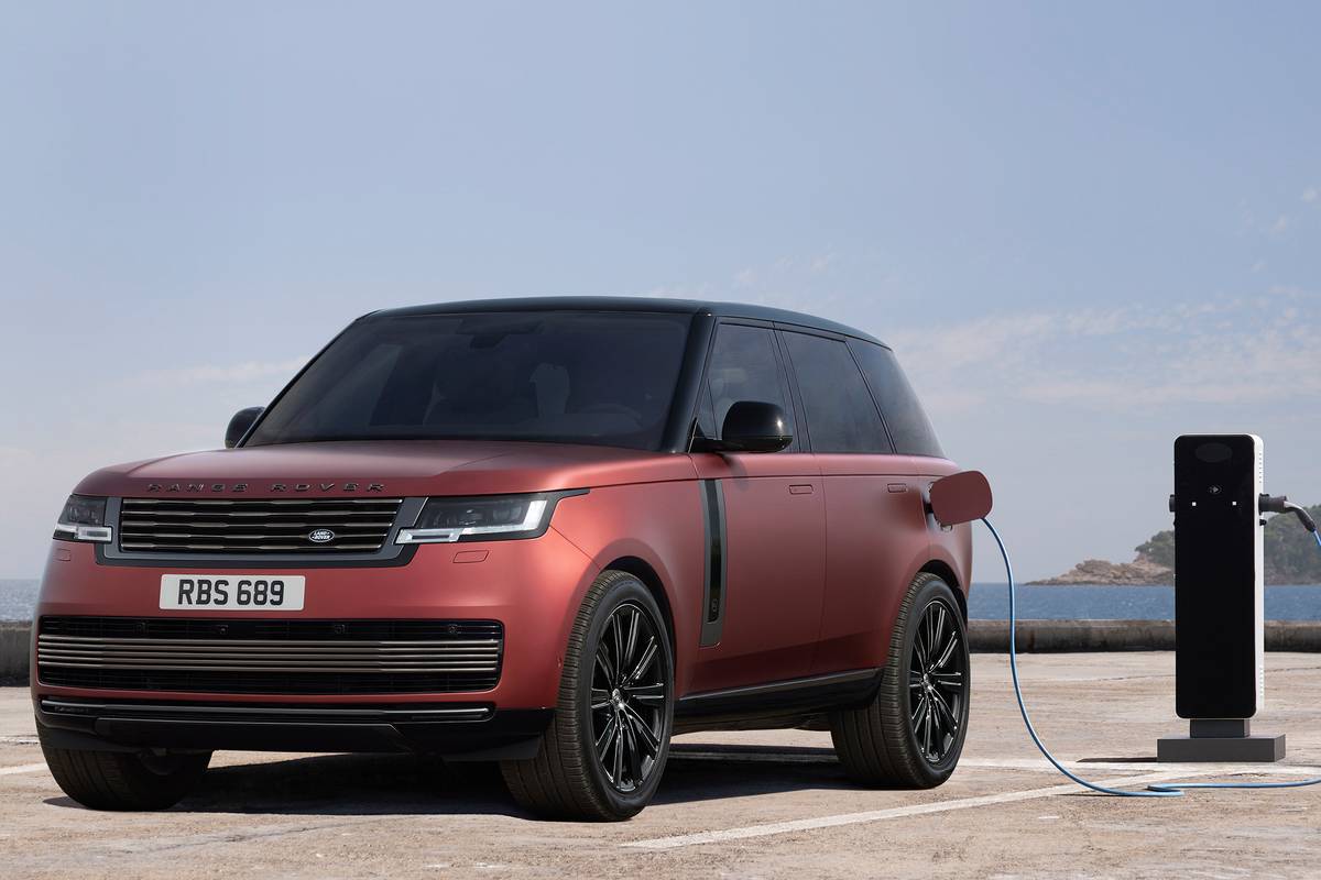 land rover range rover 2022 07 charging cable charging station exterior front angle red suv jpg