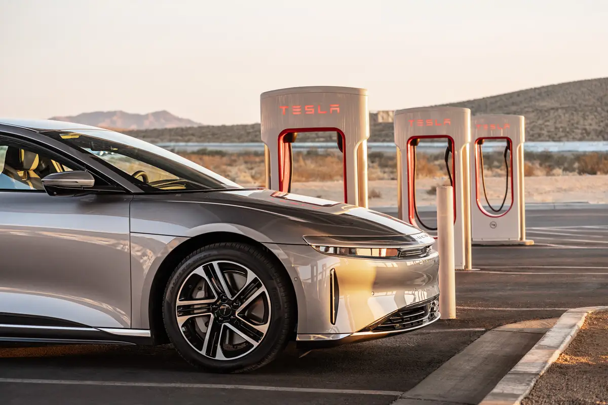 lucid air tesla supercharger 2025 exterior oem 01 jpg