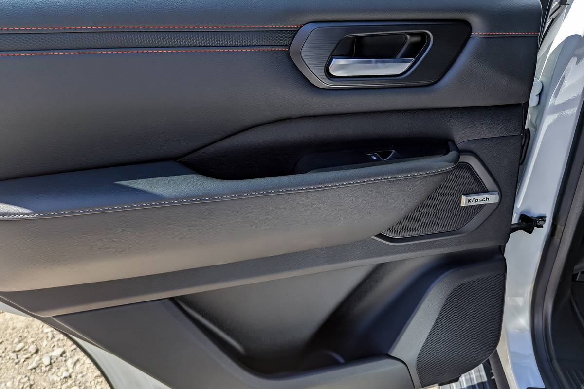 nissan armada pro 4x 2025 35 interior door jpg