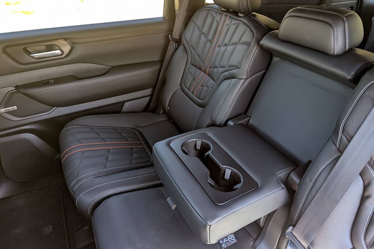 nissan armada pro 4x 2025 38 interior second row cupholder jpg