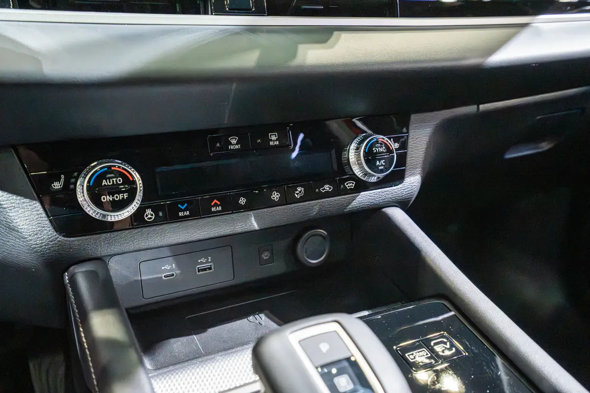 nissan rogue phev 2026 10 interior front climate controls jpg