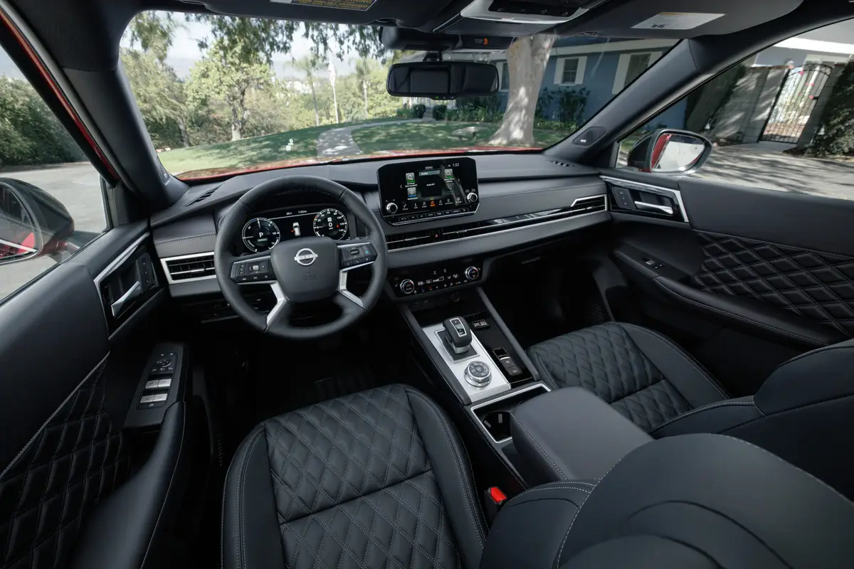 nissan rogue plug In hybrid 2026 12 interior front row oem scaled jpg