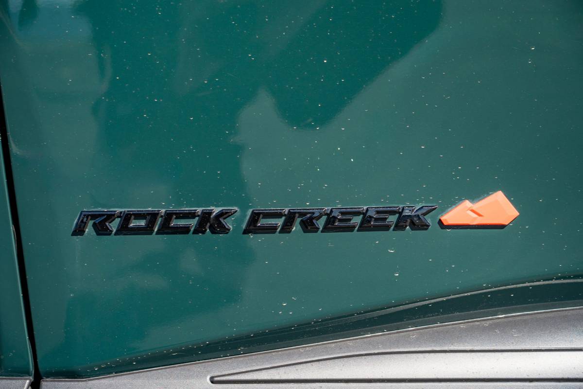 nissan rogue rock creek awd 2026 12 exterior badge detail 2 scaled jpg