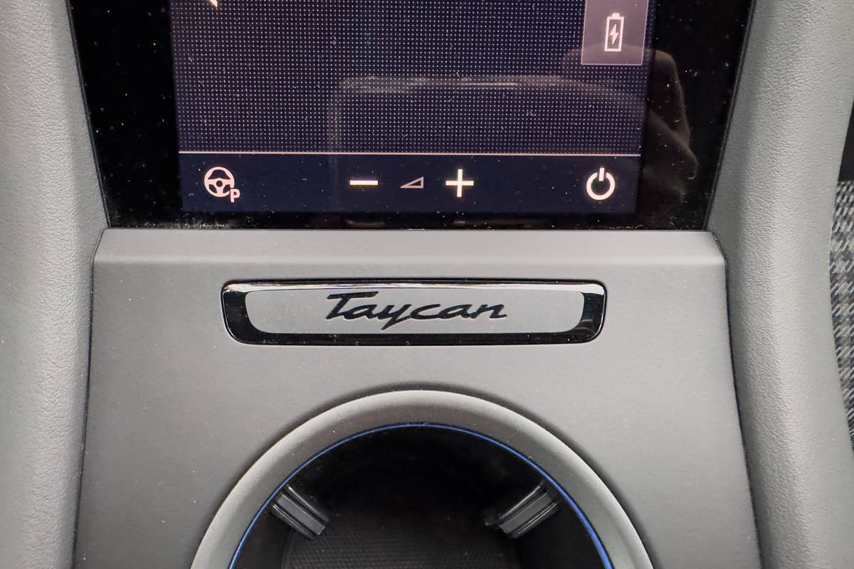 porsche taycan 4 2025 23 interior center console badge scaled jpg