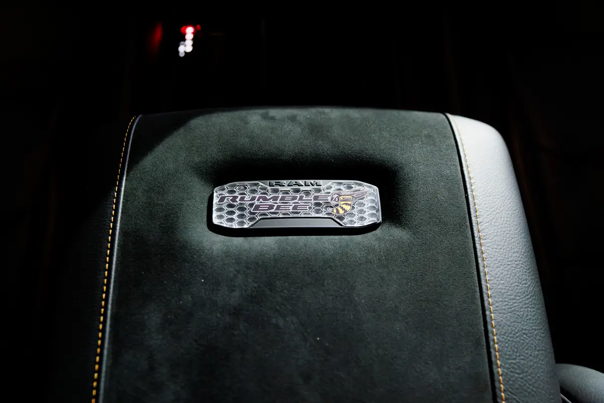 ram 1500 rumble bee srt 2027 23 interior center console badge scaled jpg