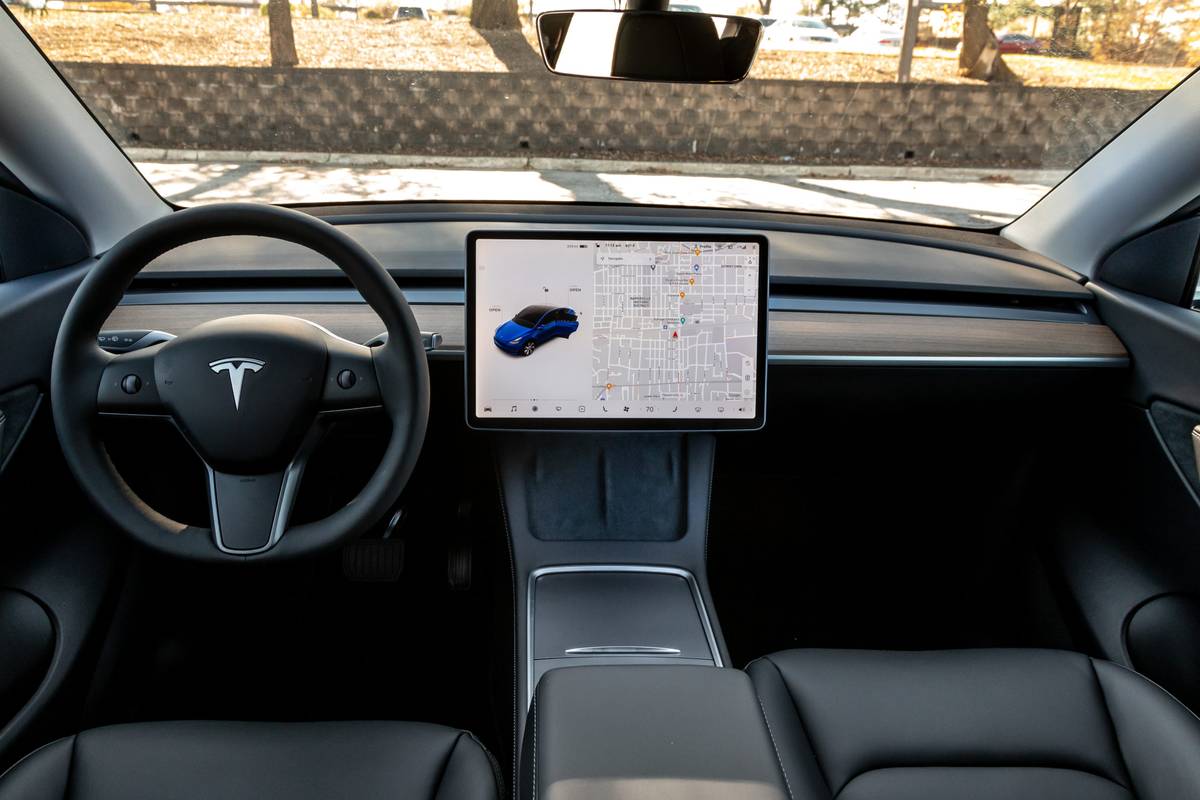Tesla Model Y Review: Sleek Interior, Easy Charging, Distracting Screen