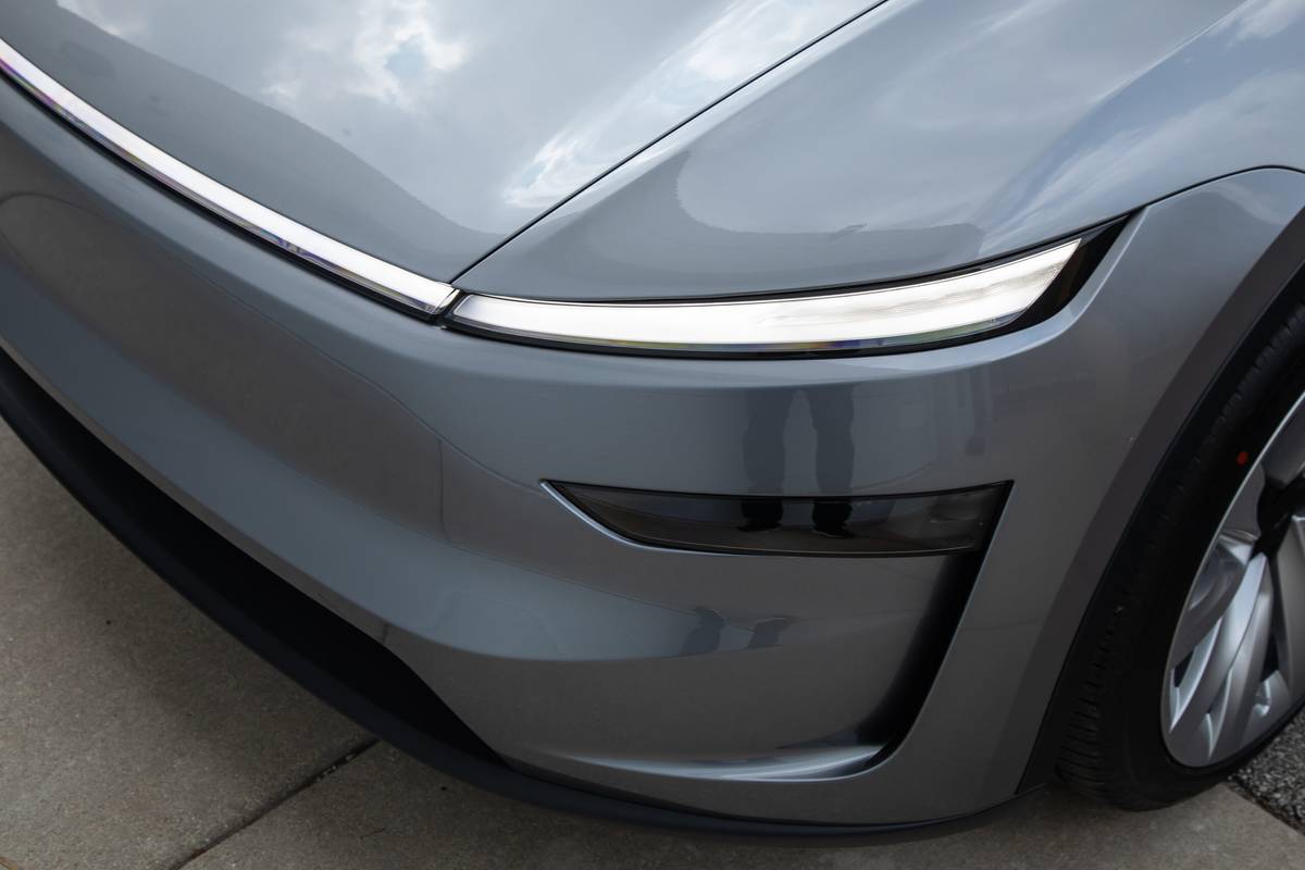 tesla model y long range awd 2025 05 exterior headlight scaled jpg
